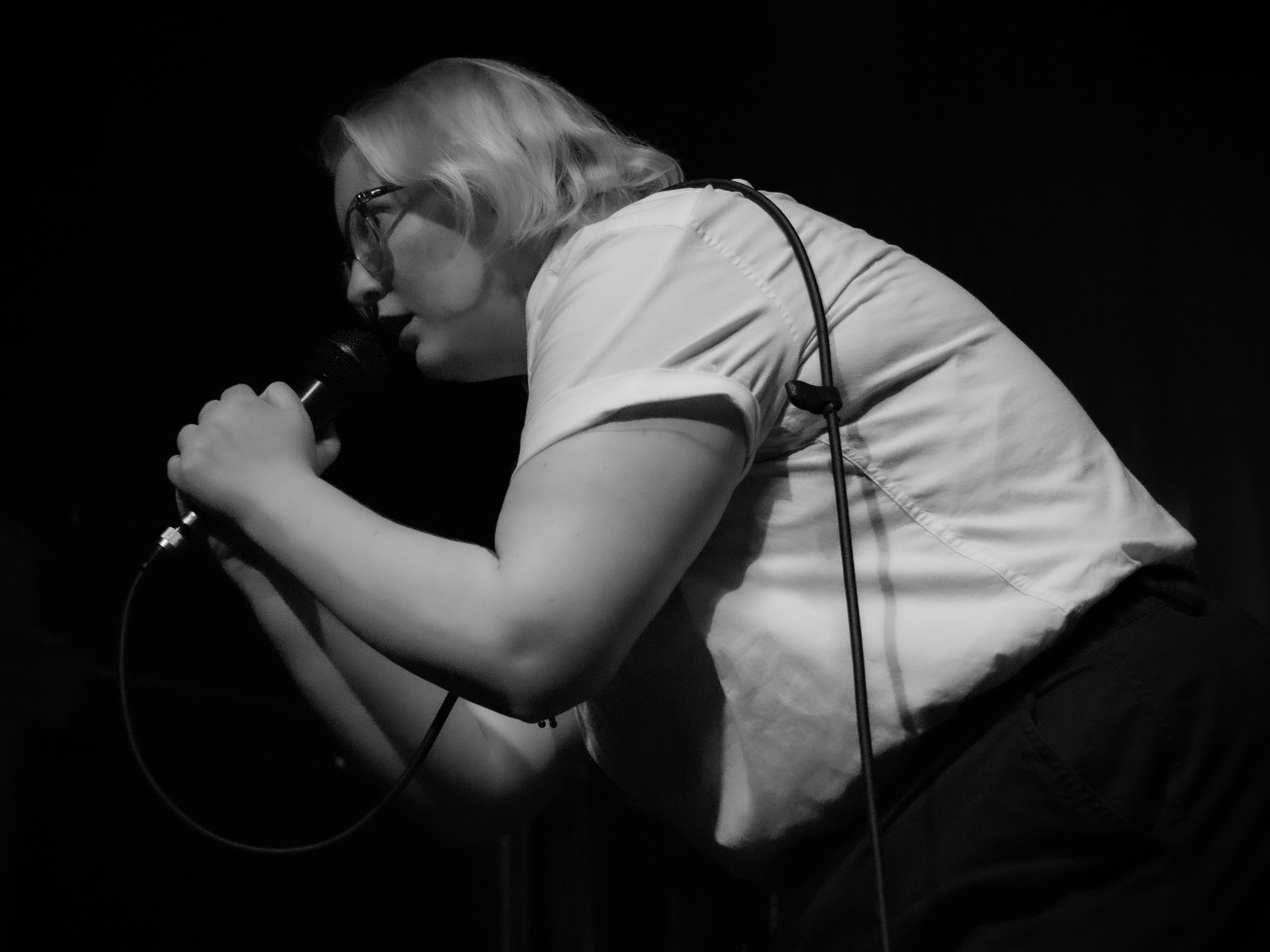 Comedian Ellie Boroughs stares down their audience.