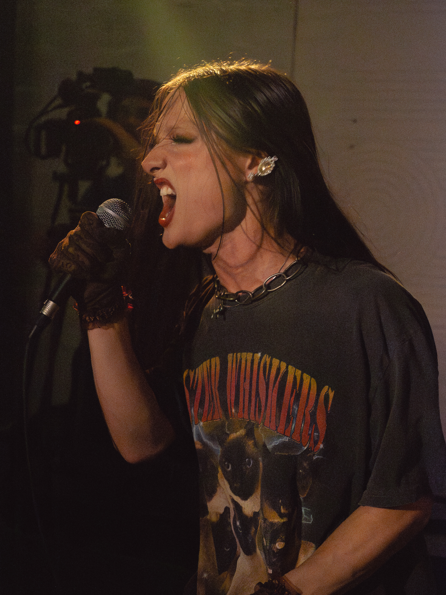 Tina Hand sings a number.