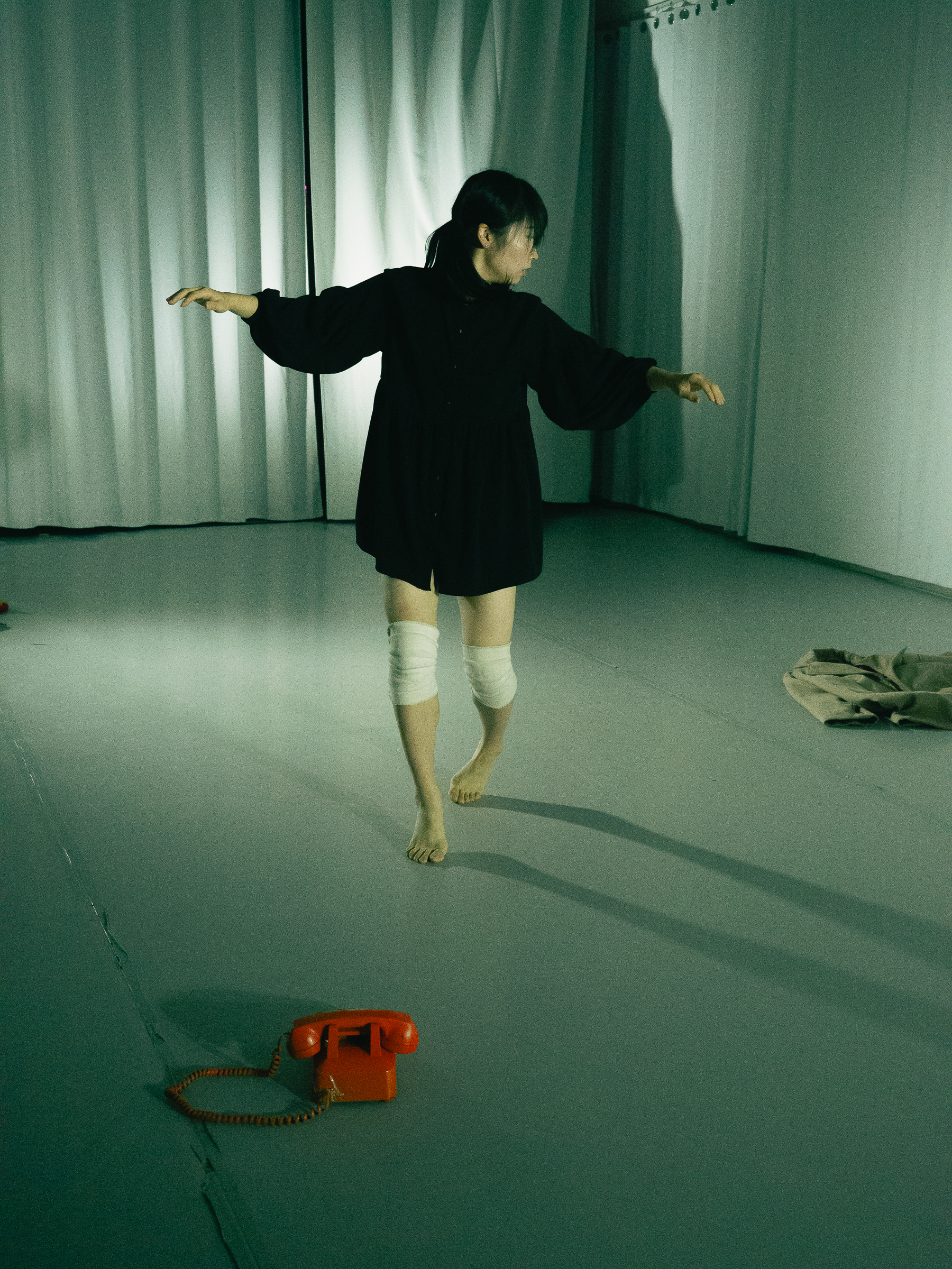 Photo of dancers performing A Dreamt up Draft of Suggestion.