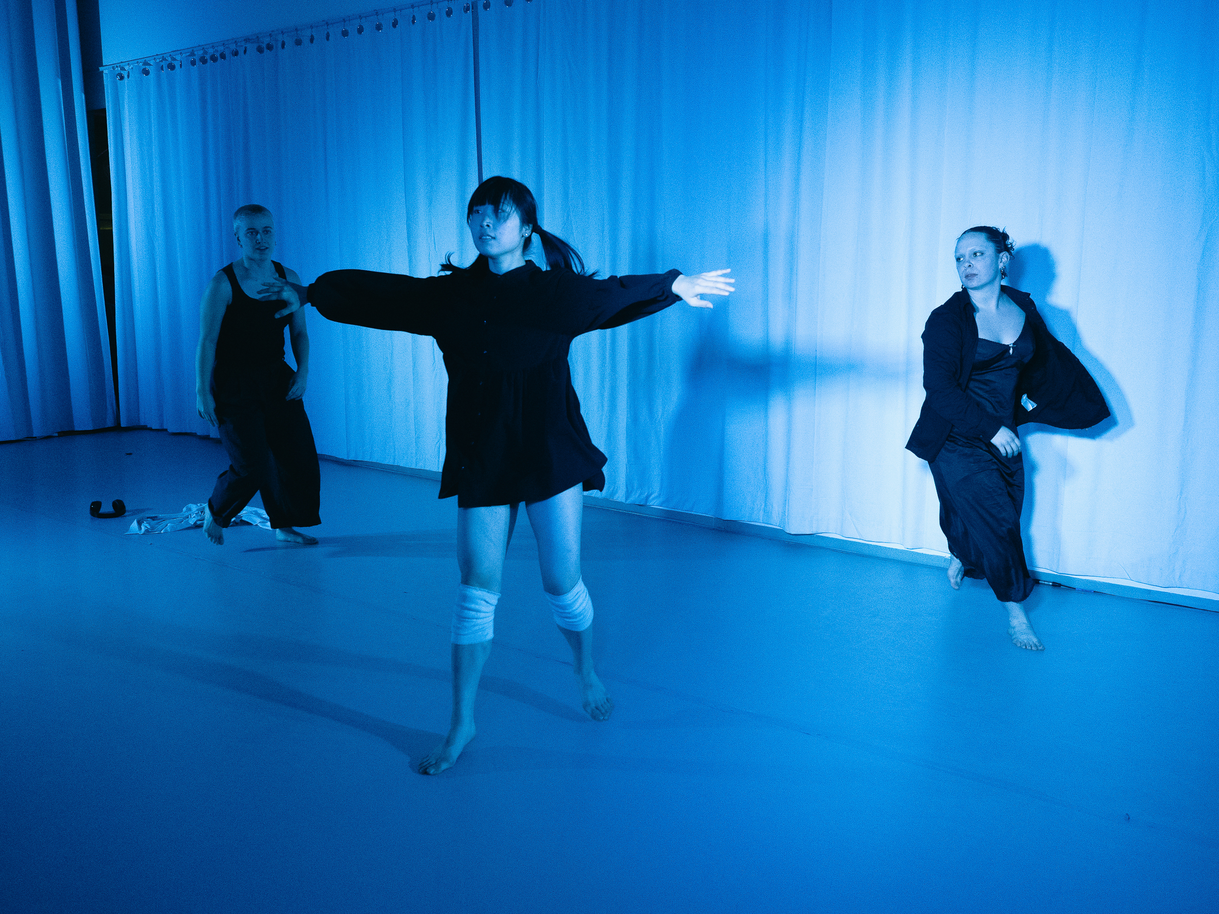 Photo of dancers performing A Dreamt up Draft of Suggestion.