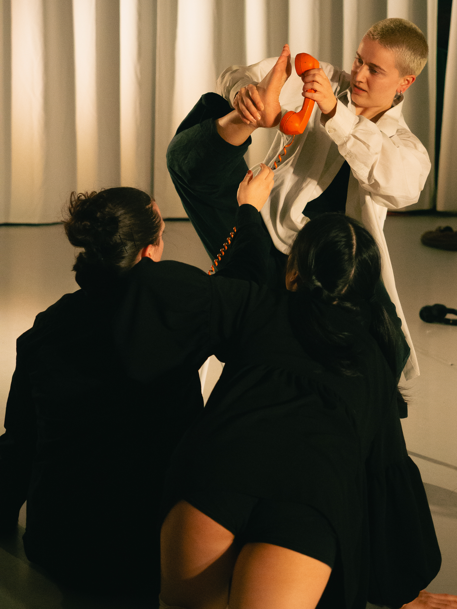 Photo of dancers performing A Dreamt up Draft of Suggestion.